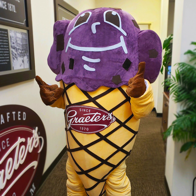 Graeter's Mascot, which is a walking Black Raspberry Chocolate Chip Ice Cream cone.