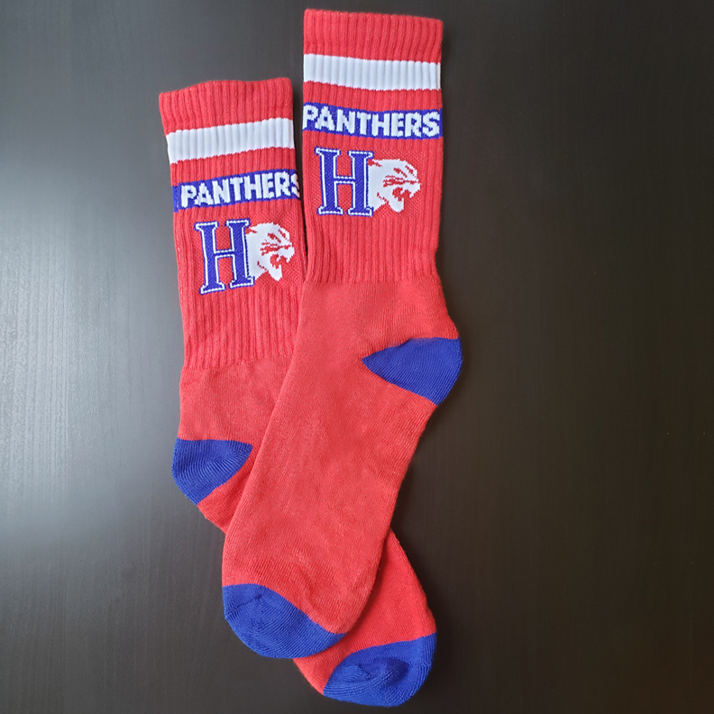 Red, blue and white socks with Hanover College's logo on the leg. Panthers is written within a blue stripe on the leg.