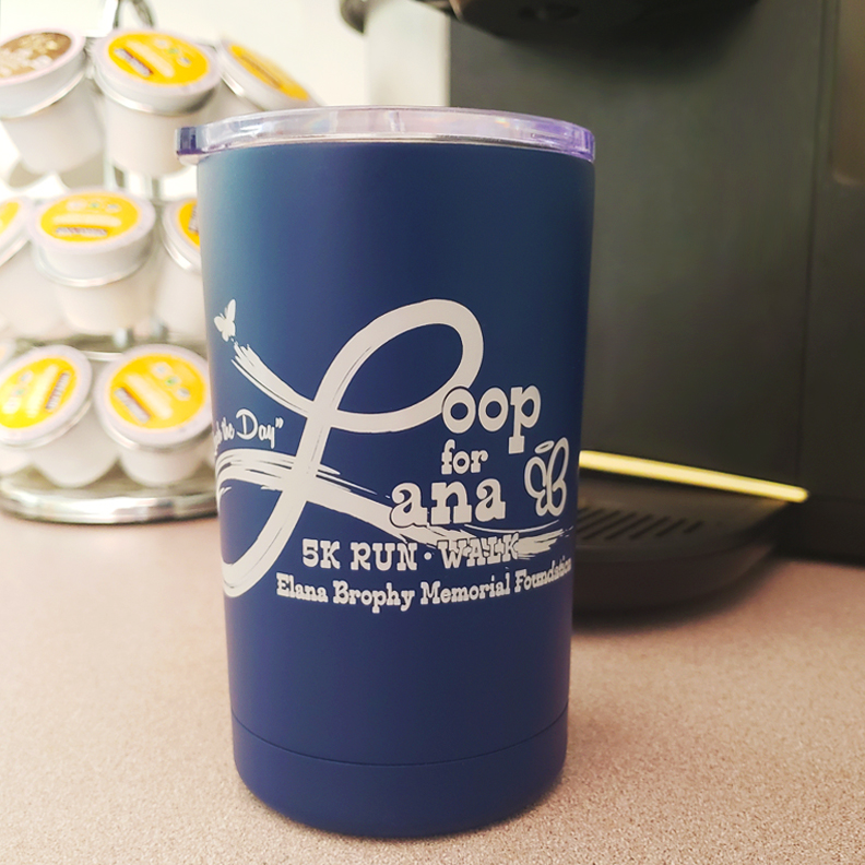 A vacuum seal blue metal cup with the words 'Loop for Lana 5k Run and Walk. Elana Brophy Memorial Foundation' on its side.